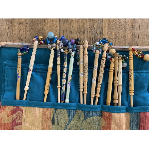 34 - Approx. 38 decorative lace bobbins, some hand painted