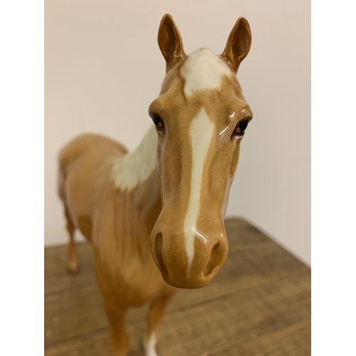 57 - A large Beswick Palomino horse figurine, approx. 11 3/4