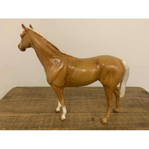 57 - A large Beswick Palomino horse figurine, approx. 11 3/4