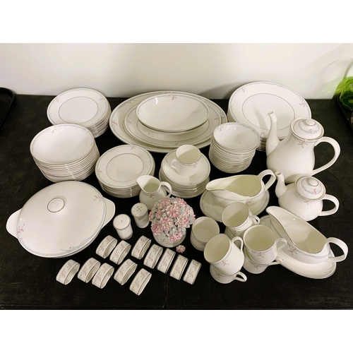 64 - Royal Doulton Carnation pattern dinner and tea wares, a large collection over two boxes, some 12 set... 