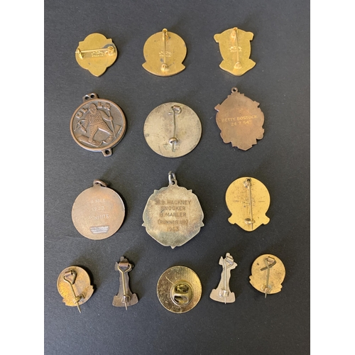 67 - A selection of vintage sports badges