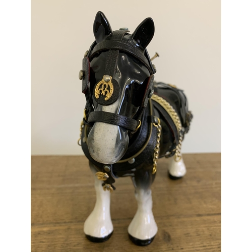 7 - A large ceramic shire horse