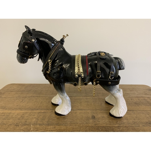 7 - A large ceramic shire horse