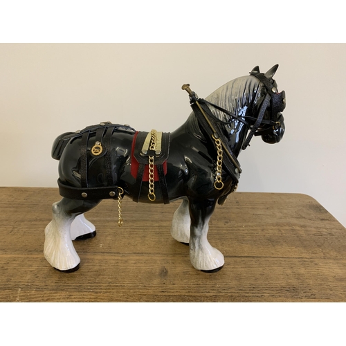 7 - A large ceramic shire horse