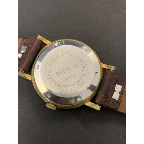 74 - A vintage Greville 21 jewels gents wristwatch, antimagnetic waterproof (winds, ticks and runs)