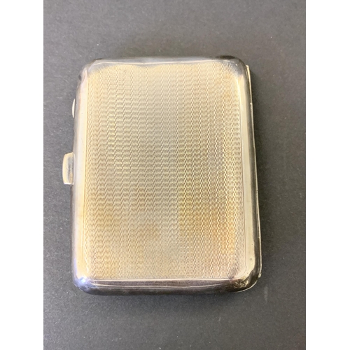 103 - A hallmarked silver cigarette case, circa 1935 with extra Jubilee mark, weight approx. 62g