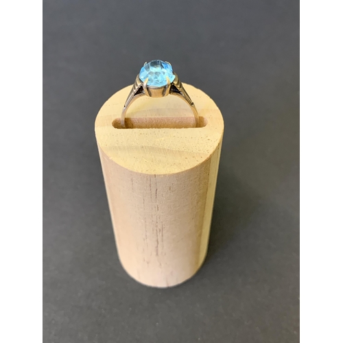 115 - A 9ct gold and blue stone set ring, approx. size M, weight approx. 1.8g (stone with large chip to ed... 