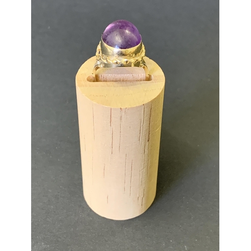 117 - A 9ct gold and amethyst colour stone ring, approx. size M, weight approx. 5.5g