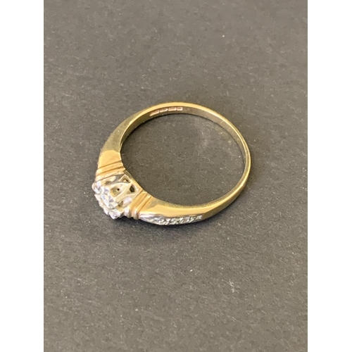 122 - A 9ct gold and diamond set ring, approx. size P, weight approx. 2.3g