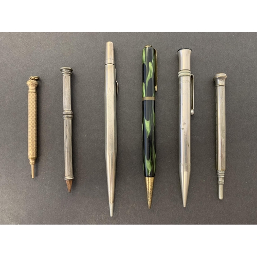 125 - Three white metal propelling pencils together with a yellow metal example, a coloured barrel 'Marby'... 