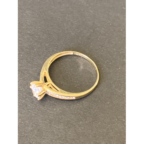 128 - A yellow metal and paste stone ring, marked 375 and 9K, approx. size M, weight approx. 1.3g