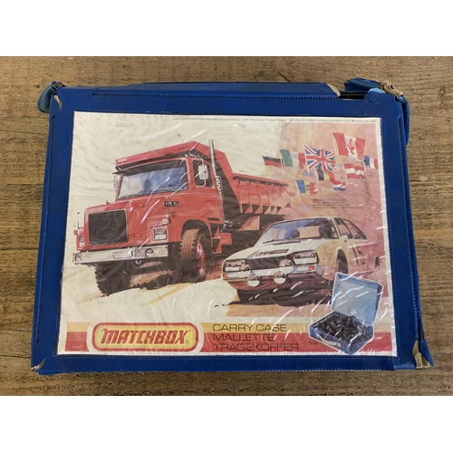 141 - A Matchbox carry case including model vehicles (play worn condition)