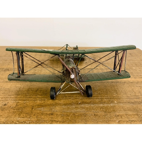 15 - A vintage tin plate bi-plane, approx. 10