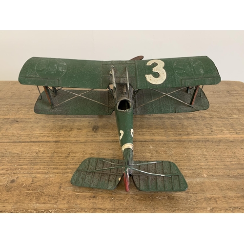 15 - A vintage tin plate bi-plane, approx. 10