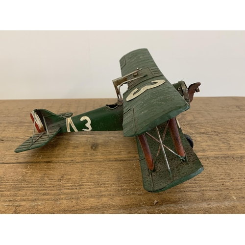 15 - A vintage tin plate bi-plane, approx. 10