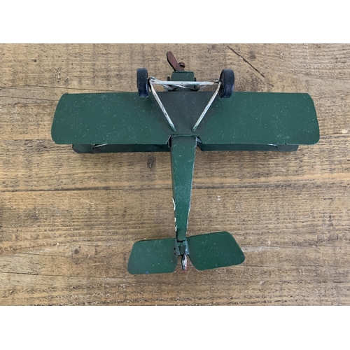 15 - A vintage tin plate bi-plane, approx. 10