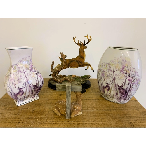 150 - Two ceramic vases featuring stags both 10