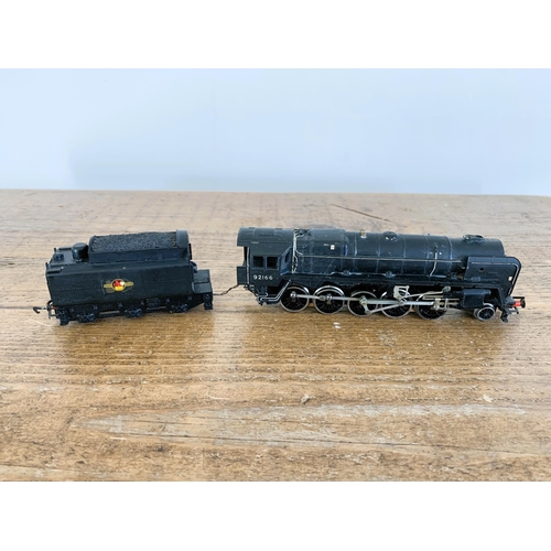 180 - A mixed lot including 00 gauge loco and tender and N gauge carriages etc plus a 007 Corgi Lotus Espr... 