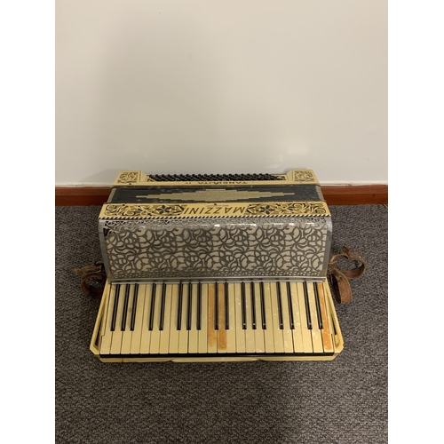 204 - A large cased 'Mazzini Tangolita IV' accordion (not tested)