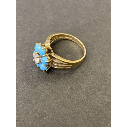 243 - A 9ct gold with white stone and turquoise set ring, approx. size N, weight approx. 4g