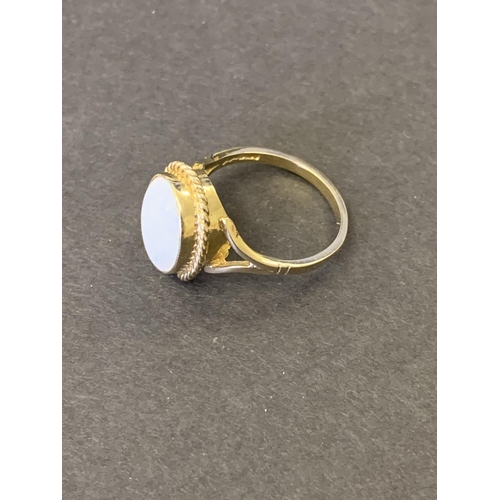 247 - A 9ct gold and opal set ring, approx. size O, weight approx. 3.4g