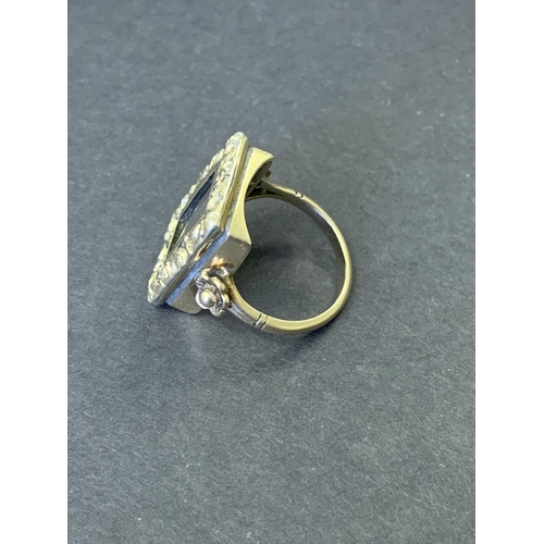 249 - An unusual 9ct gold shank Victorian mourning ring, the top section with preserved hair in an ornate ... 