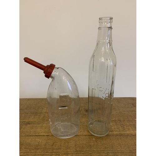 25 - A vintage 'Solvol' glass oil bottle, 14 3/4