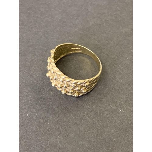 251 - A 9ct gold gents keeper ring, approx. size U, weight approx. 6g