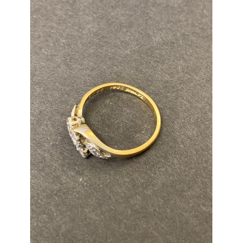 255 - An 18ct gold and diamond set ring, formally platinum plated, approx. size L, weight approx. 2.5g