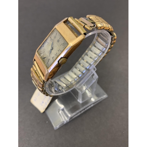 261 - A 9ct gold cased 1930's wristwatch with inscription, dated Oct 1938, total weight with strap approx.... 