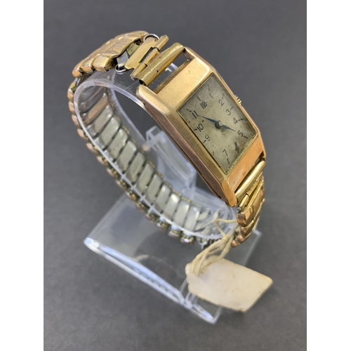 261 - A 9ct gold cased 1930's wristwatch with inscription, dated Oct 1938, total weight with strap approx.... 