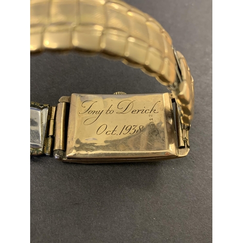 261 - A 9ct gold cased 1930's wristwatch with inscription, dated Oct 1938, total weight with strap approx.... 