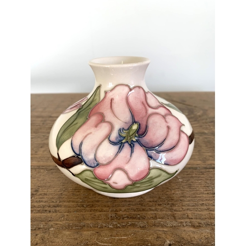 275 - A Moorcroft pink magnolia pattern squat vase, circa 1980's, 4 1/4