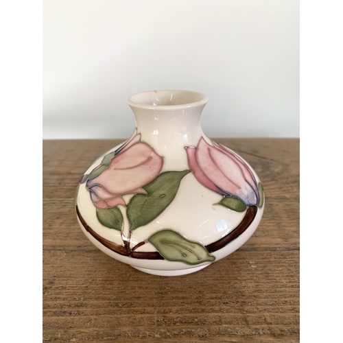 275 - A Moorcroft pink magnolia pattern squat vase, circa 1980's, 4 1/4