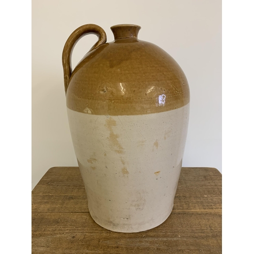 284 - A large stoneware flagon, approx. 20