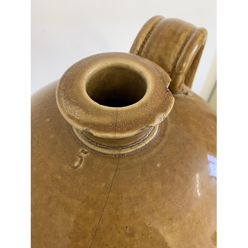 284 - A large stoneware flagon, approx. 20