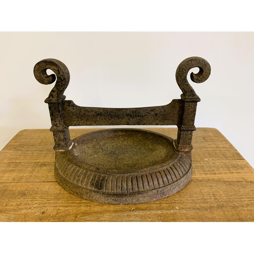 285 - An antique cast iron boot scraper