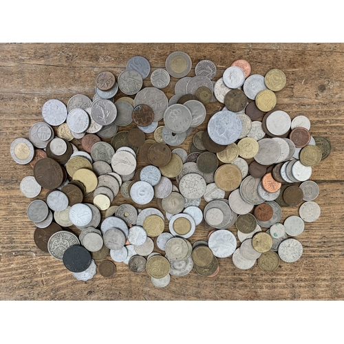 290 - A small tub of mixed world coins