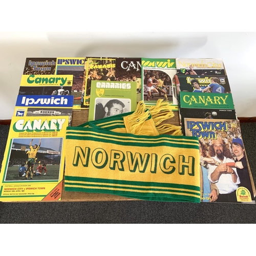 292 - A Norwich City supports scarf plus 12 Norwich V Ipswich Derby Games programmes, 1970's and 1980's