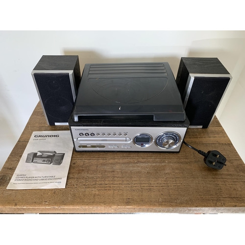 347 - A Grundig CURPA3 mini compact stereo system, turntable, CD player and radio with speakers (lid as fo... 