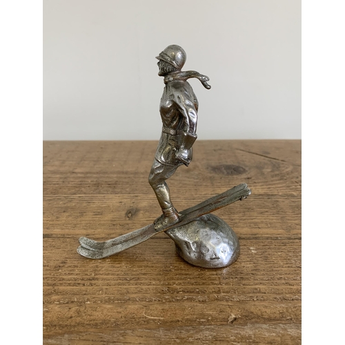 38 - An original scarce 1930's white metal car mascot 'Ski Lady' for the Riley Alpine car, marked to the ... 