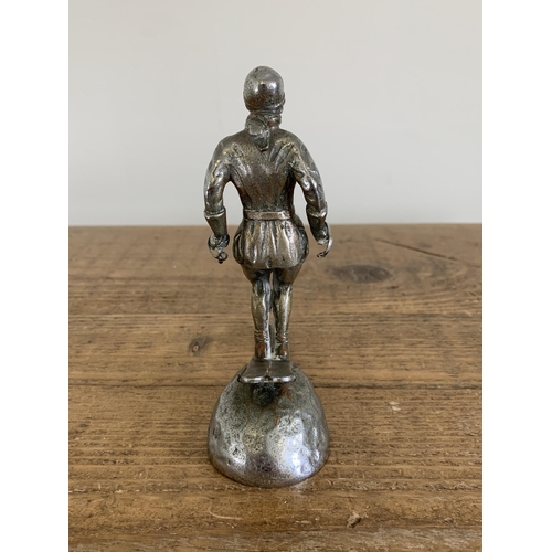 38 - An original scarce 1930's white metal car mascot 'Ski Lady' for the Riley Alpine car, marked to the ... 