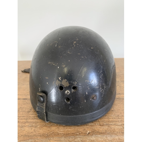 51 - A late 1930's German motorcycle helmet, reputedly worn by Ewald Kluge in the 1938 Isle of Man TT rac... 