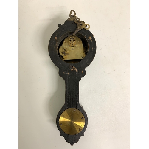 70 - A small late 19th/early 20th Century wood cased clock and barometer, complete with key, 14