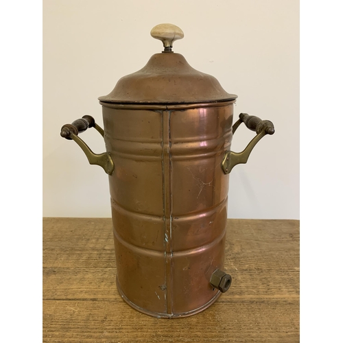 79 - An antique copper and brass samovar (lacking base)