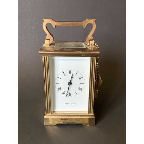 81 - A heavy brass Mappin & Webb key wind carriage clock with presentation plaque to front (winds, ticks ... 