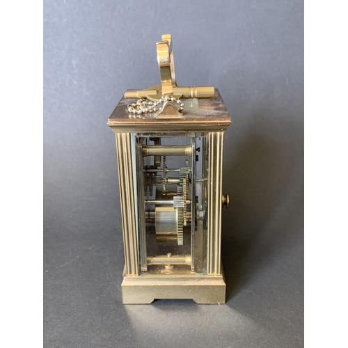 81 - A heavy brass Mappin & Webb key wind carriage clock with presentation plaque to front (winds, ticks ... 