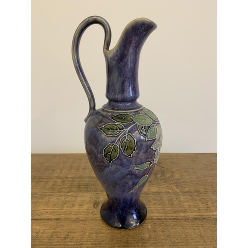 84 - A large Royal Doulton tube lined stoneware ewer by Joan Honey, circa 1910, 12