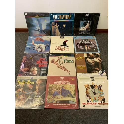 99 - Twelve vintage laser disc films including 1982 'Star Wars', 1980 double bill 'The Postman Always Rin... 