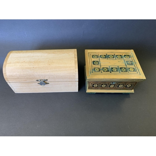 125 - Two small wooden jewellery boxes and costume contents